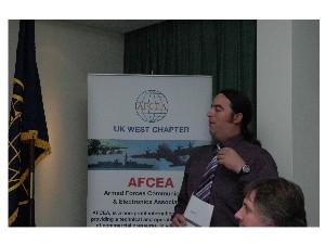 April guest speaker Jon Dudley of QinetiQ's Maritime Division gives a presentation to the chapter.
